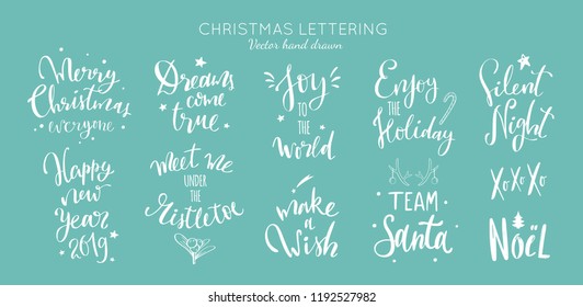 Christmas and New Year Lettering and Calligraphy phrases set.  Vector handwritten modern Lettering