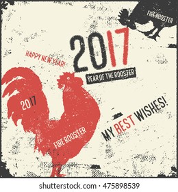 Christmas and New Year lettering calligraphy greeting card with 2017 year of the red fire rooster. Vector illustration