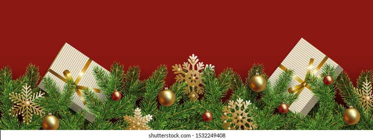 Christmas, New Year lower border. Realistic branches of Christmas tree decorated golden and red Christmas balls, snowflakes and gift boxes. Xmas element for festive design isolated on red background