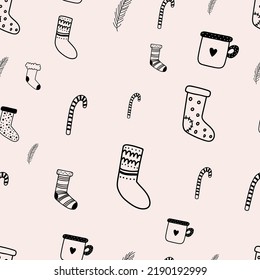 Christmas and New Year pattern made with socks sweets and hot chocolate cups. Line art style. Hand drawn design.