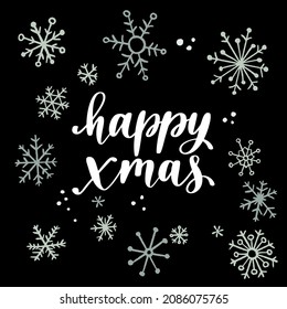 Christmas and New Year quote. Modern lettering and flat hand drawn decorative snowflakes. Vector illustration for cards, leaflets or banners on black background.