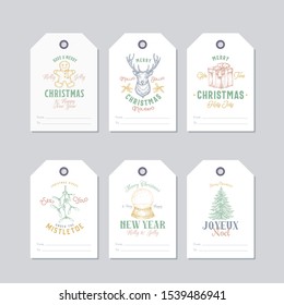 Christmas and New Year Ready-to-Use Pastel Colour Gift Tags or Labels Templates Set. Hand Drawn Reindeer, Cookie Man, Mistletoe, Snowball, Pine and Gift Box Sketches with Retro Typography. Isolated.