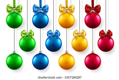 Christmas or new year realistic toys with bows hanging on chains. Merry christmas fir tree decorations, colored baubles with bow-knots, colored spheres for xmas holidays. Celebration theme