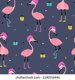 Christmas and New Year seamless pattern with holiday flamingo in red hats and gifts on a blue background. Funny Christmas design. Vector illustration.