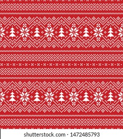 Christmas and New Year seamless pattern. Red and white pixel pattern in red and white with stylized snowflakes and Christmas trees for winter hat, sweater, jumper, paper, or other designs.