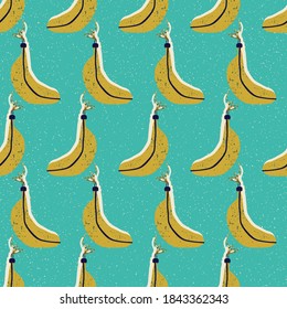 Christmas and New Year seamless pattern with tree toys in the form of bananas in vector.