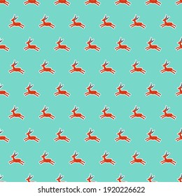Christmas and New Year seamless pattern. Christmas orange deer. Winter pink vector background.