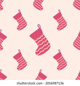 Christmas and New Year seamless pattern with red socks