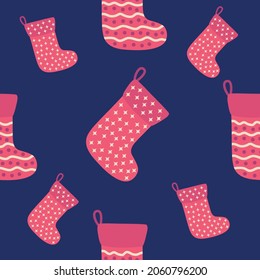 Christmas and New Year seamless pattern with red socks