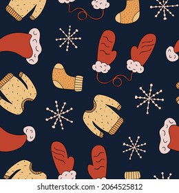 Christmas and New year seamless pattern with Santa Claus’ red hat, cozy sweater, snowflake, mittens with a fur, knitted sock. Cute hand drawn vector illustrations with outline on dark background.