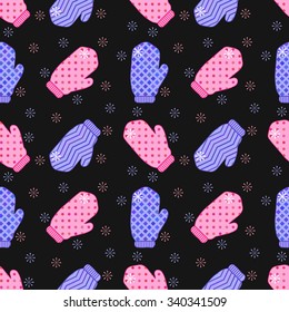Christmas and New Year seamless pattern with winter knitted mittens and snowflakes on the black background.