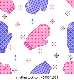 Christmas and New Year seamless pattern with winter knitted mittens and snowflakes on the white background.