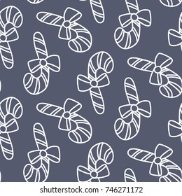 Christmas New Year seamless pattern background with candy, cane, bow. Outline vector illustration. Good for wrapping, invitation and card. Winter holiday symbol