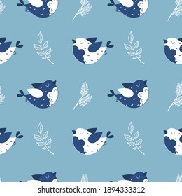 Christmas and New Year seamless vector pattern with birds and branches. Blue and white palette. Cute hand drawn winter background for wrapping paper, print, card, gift, fabric, wallpaper, banner, web.