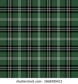 Christmas and new year tartan plaid. Scottish pattern in black, green and white cage. Scottish cage. Traditional Scottish checkered background. Seamless fabric texture. Vector illustration