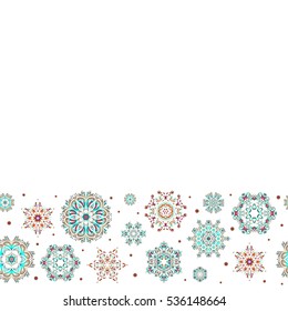 Christmas and New Year theme. Vector winter design on white background. Happy smiling blue, brown and beige snowflakes seamless pattern. Snowflakes decorated with circles and dots.