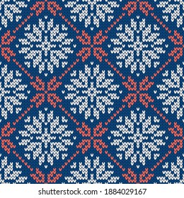 Christmas and New Year traditional knitted seamless pattern with snowflakes. Norwegian style sweater. Wool texture. Vector illustration. Holiday background.