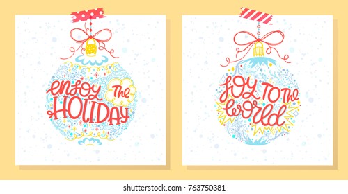 Christmas and New Year typography.Hand drawn lettering with snowflakes,sparkles and floral elements arranged in a Christmas balls.Seasons greetings card perfect for prints,flyers,invitations and more.