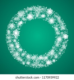 Christmas or New Year wreath made of shining snowflakes. Celebration border frame decoration with snowflakes. Greeting card with a festive wreath. Invitation - banner, poster, background.