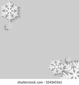 Christmas and New Year's background with place for your text.White snowflakes on a white knitted background