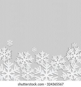 Christmas and New Year's background with place for your text.White snowflakes on a white knitted background