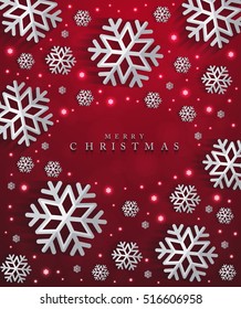 Christmas and New Years red background with paper snowflakes 