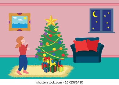 Christmas night. Little girl is watching at the Christmas tree