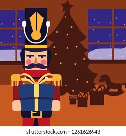 christmas nutcracker holding gift box with tree