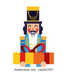 christmas nutcracker holding gift box
