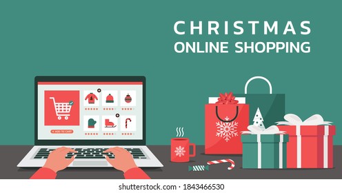 Christmas online shopping banner concept, human hand makes order on laptop screen with gift boxes, shopping bags on the desk, and text, winter holidays sales, flat vector illustration