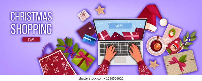 Christmas online shopping banner with laptop top view, hands, presents, bag, Santa hat. Winter holiday x-mas sale offer background with gift boxes, wallet,bank card.Christmas internet shopping concept