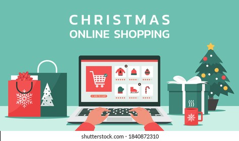 Christmas online shopping concept, human hand makes order on laptop screen with gift boxes, shopping bags on the desk, and text, winter holidays sales, flat vector illustration