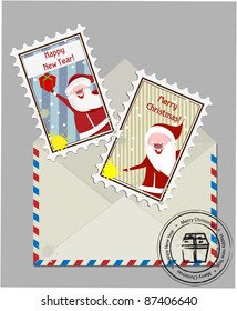 Christmas open envelop and two Santa stamps