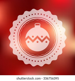 Christmas ornament badge vector with rounded designs placed on a red blur background. Traditional christmas ball on a holiday style defocused background.