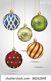 Christmas ornaments hanging on gold thread. Vector illustration