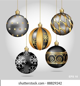 Christmas Ornaments Hanging on Gold Thread