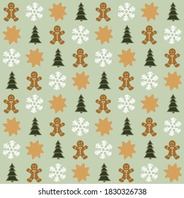 Christmas ornaments pattern on a green background. With gingerbreadman, christmas tree, stars and snowflakes.