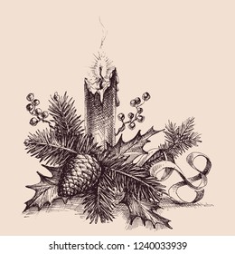 Christmas ornaments, pine tree twigs and lit candle 