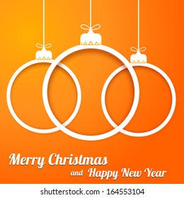 Christmas paper cut balls with text on orange backgraund