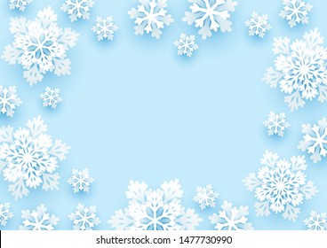 Christmas paper snowflakes on blue background for Your winter holiday design 