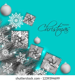 Christmas party invitation template greeting card with gift boxes, pine and fir branches wreath in the snowflake, lights, ball, blue background