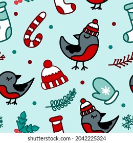 Christmas pattern with a bullfinch hat and a candy cane. The concept of Christmas and New Year. Vector illustration.