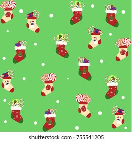 Christmas pattern consist from christmass socks on blue background