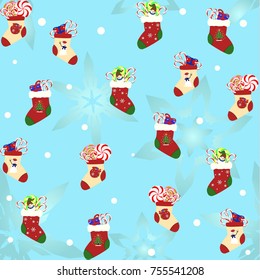 Christmas pattern consist from christmass socks on blue background