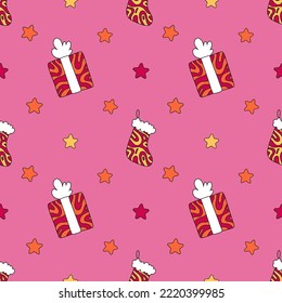 Christmas pattern with gift box, stocking and stars. Vector seamless illustration.