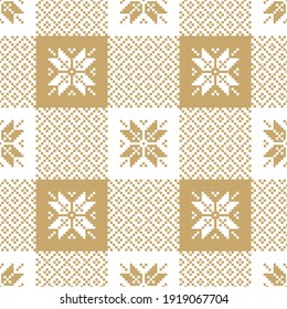 Christmas pattern in gold and white. Buffalo check plaid. Seamless decorative vichy gingham pixel art with snowflakes for tablecloth, gift wrapping paper, other modern Scandinavian textile or paper.