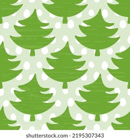 Christmas pattern with green fir trees and white polka dots on a bluish background, with an old vintage texture, artistic. Vector illustration, seamless.