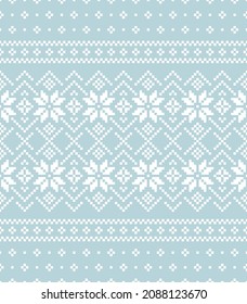 Christmas pattern with nordic fair isle motif in blue and white. Seamless pixel Scandinavian illustration for New Year jumper, socks, mittens, other modern winter holiday textile or gift paper print.