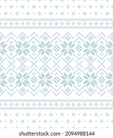 Christmas pattern with nordic fair isle print in blue and white. Seamless pixel Scandinavian vector for New Year jumper, socks, mittens, other modern winter holiday fabric or gift paper design.