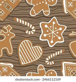 Patrón de Navidades. Impresión sin fisuras con galletas de jengibre. Casas de jengibre, ciervo, corazón, hombre de jengibre, estrella. Lindo Fondo. Plantilla. Ilustración vectorial sobre fondo de madera